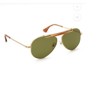 Krewe Carver 24K Tobacco polarized. Grass Green
